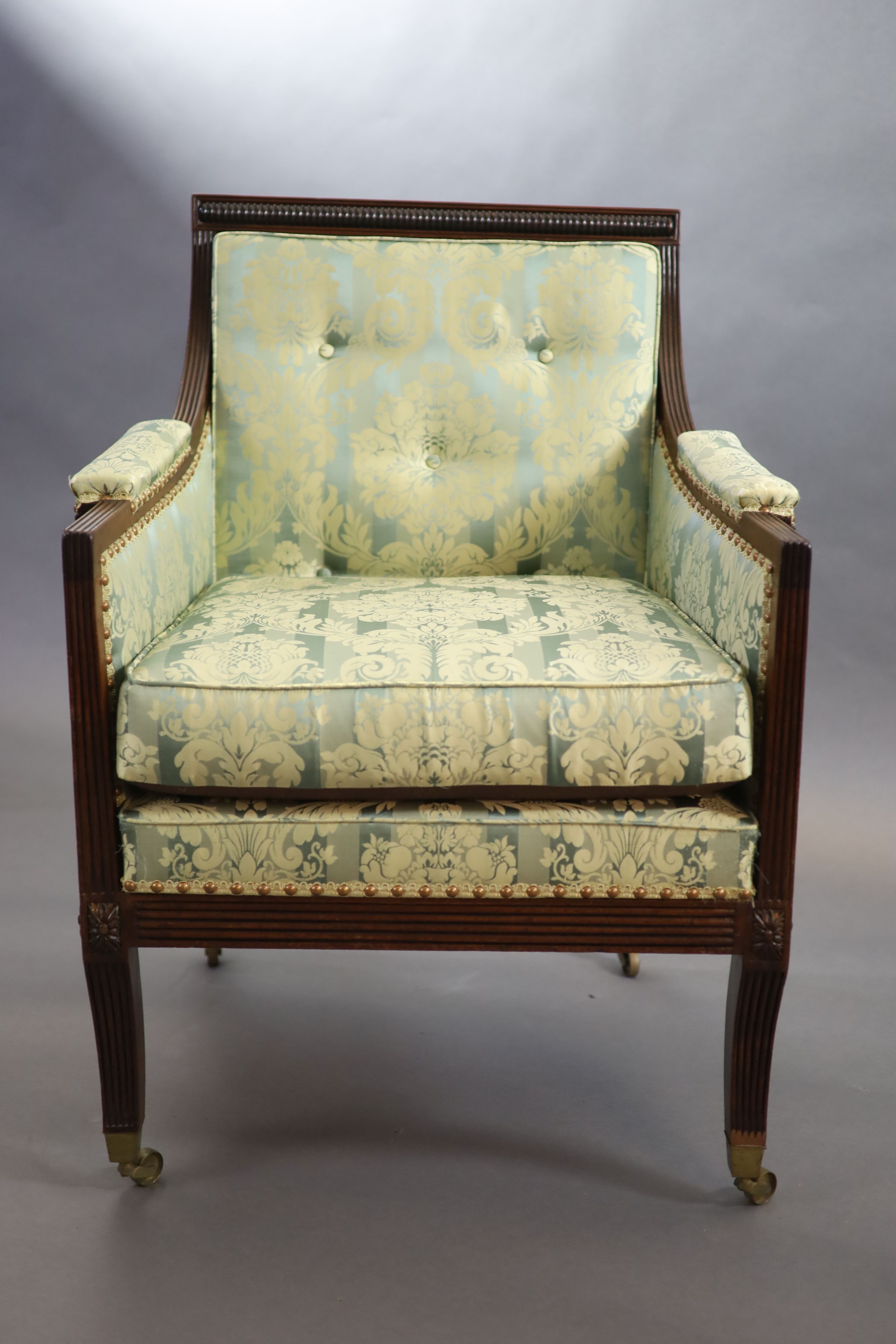 A Regency mahogany library armchair, W.68cm H.92cm D.72cm